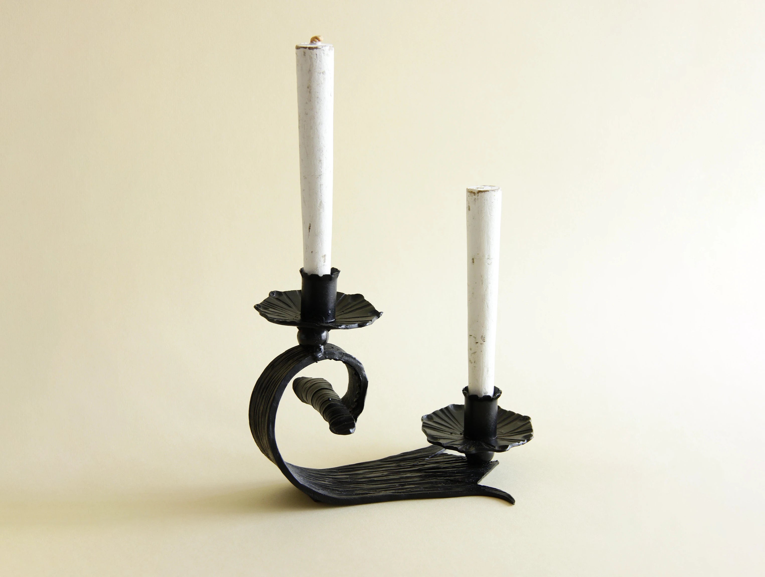 1970s hand-forged iron candle holder, front view