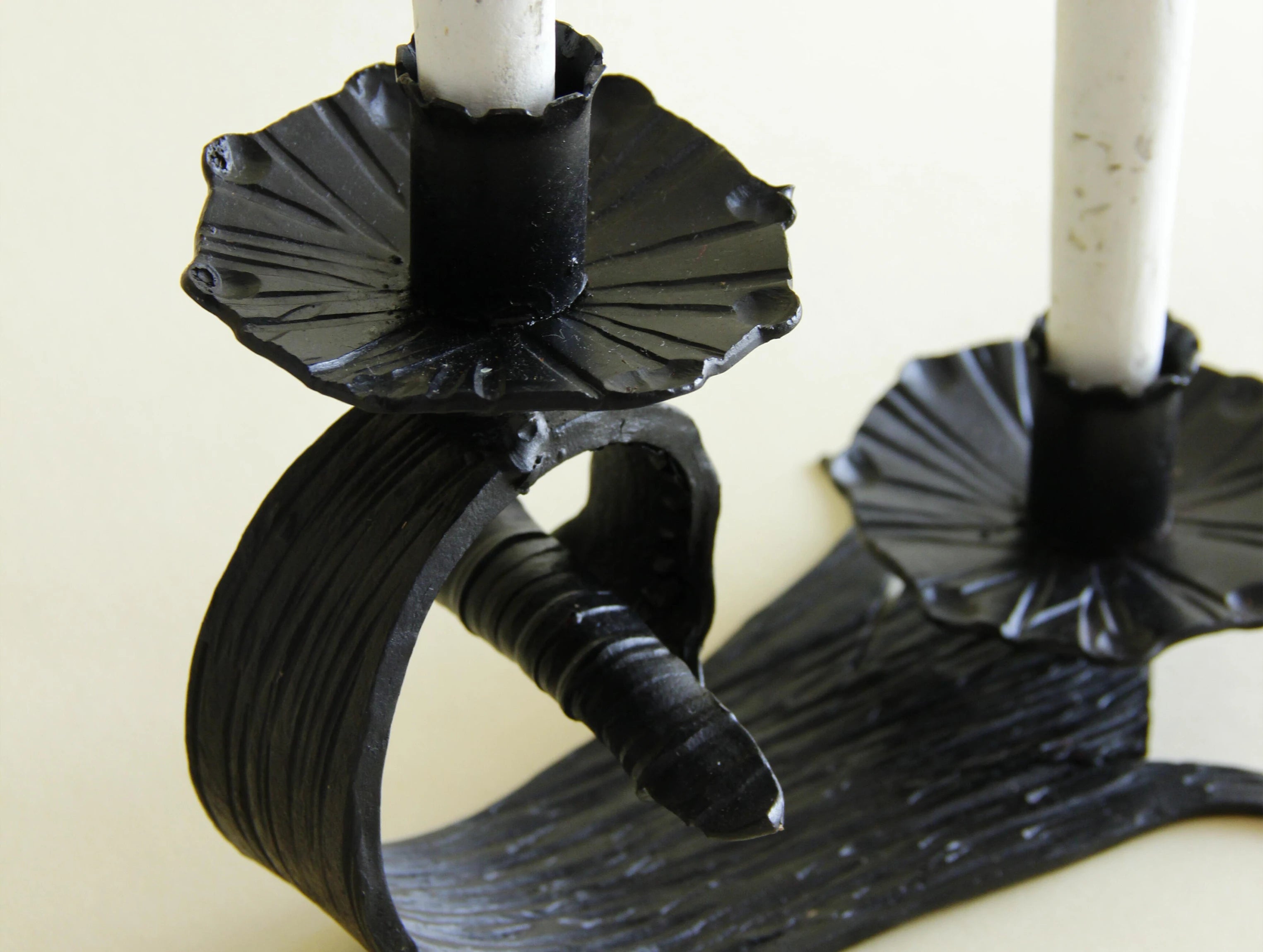 1970s hand-forged iron candle holder, scale and form