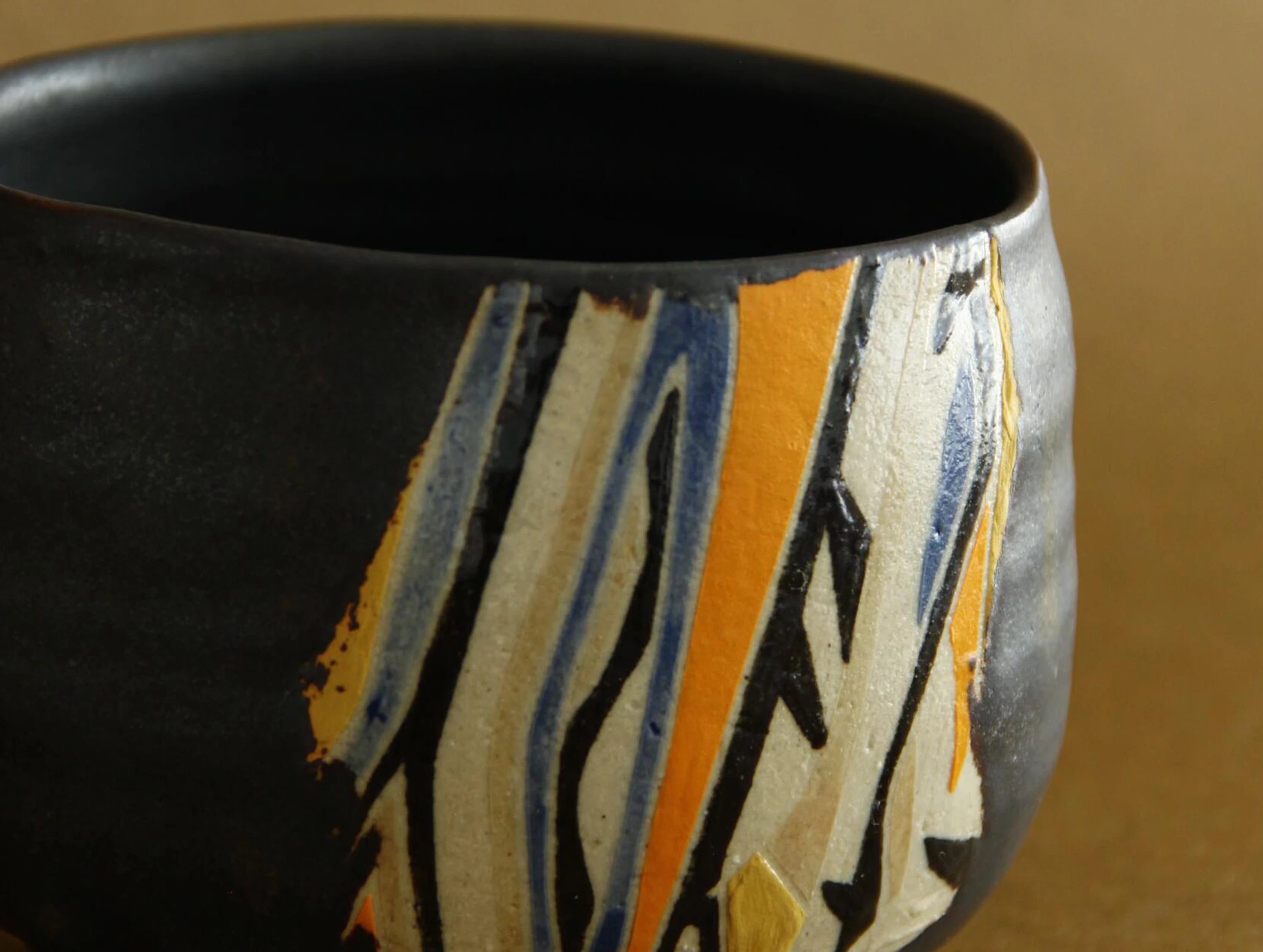 Black-glaze geometric bowl, side view
