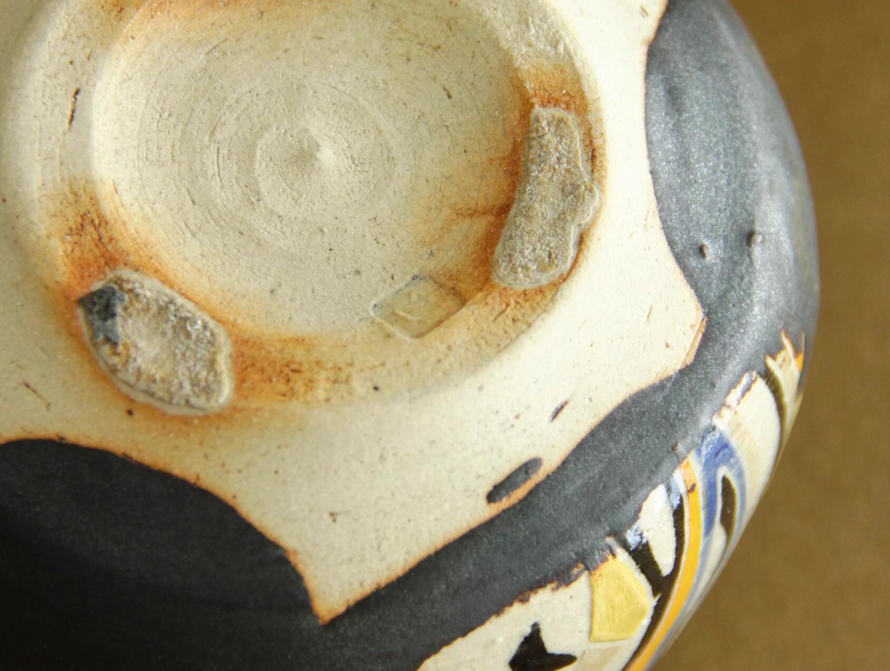 Black-glaze geometric bowl, scale and form