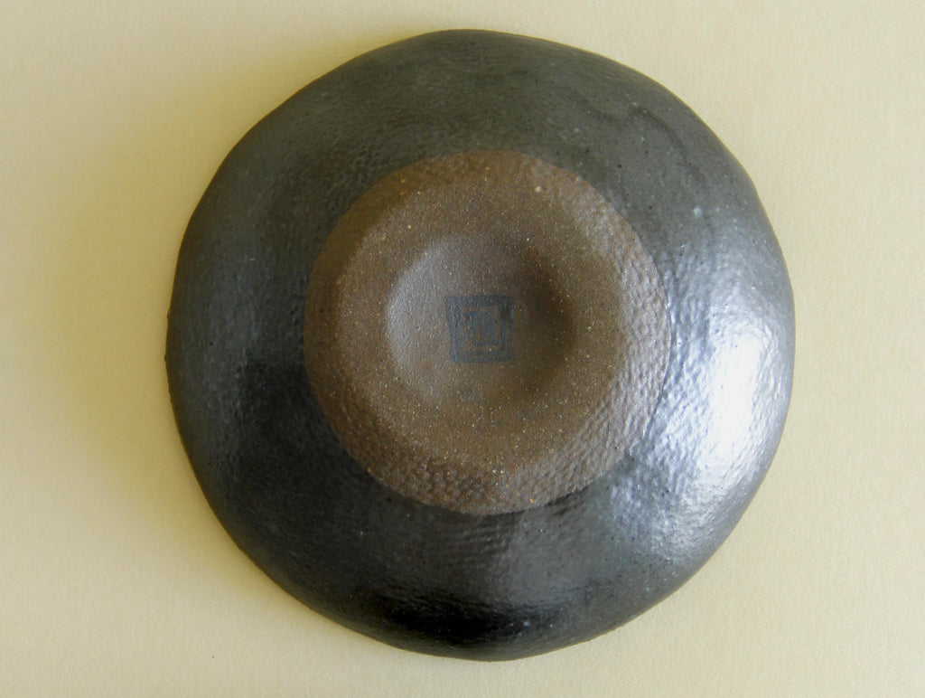 Black-glaze and gilt floral dish, side view