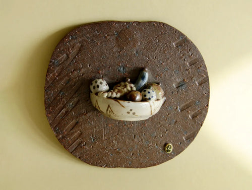 Kazufumi Wada ceramic wall plaque, front view