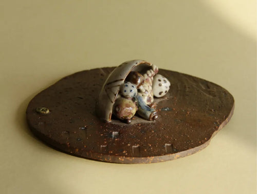 Kazufumi Wada ceramic wall plaque, three-quarter view