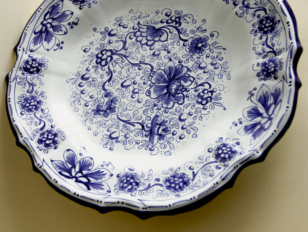 Majolica cobalt floral display plate, side view