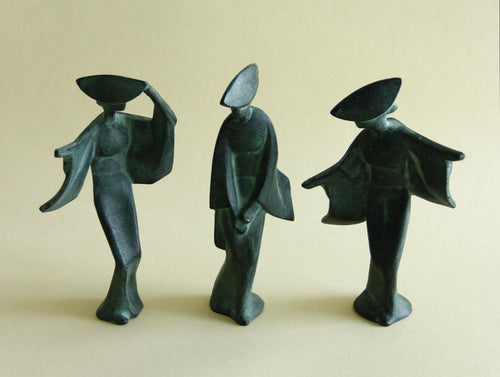Mid-century cast-iron geisha sculpture set, front view