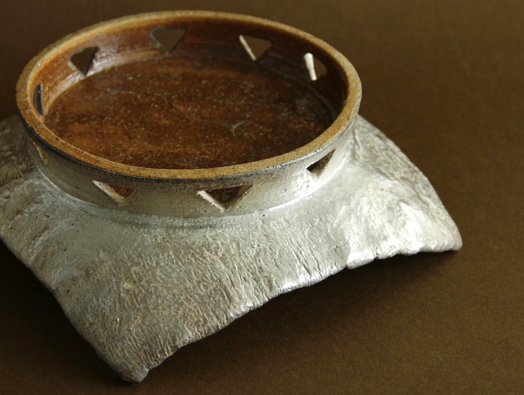 Silver-finish square footed tray, scale and form