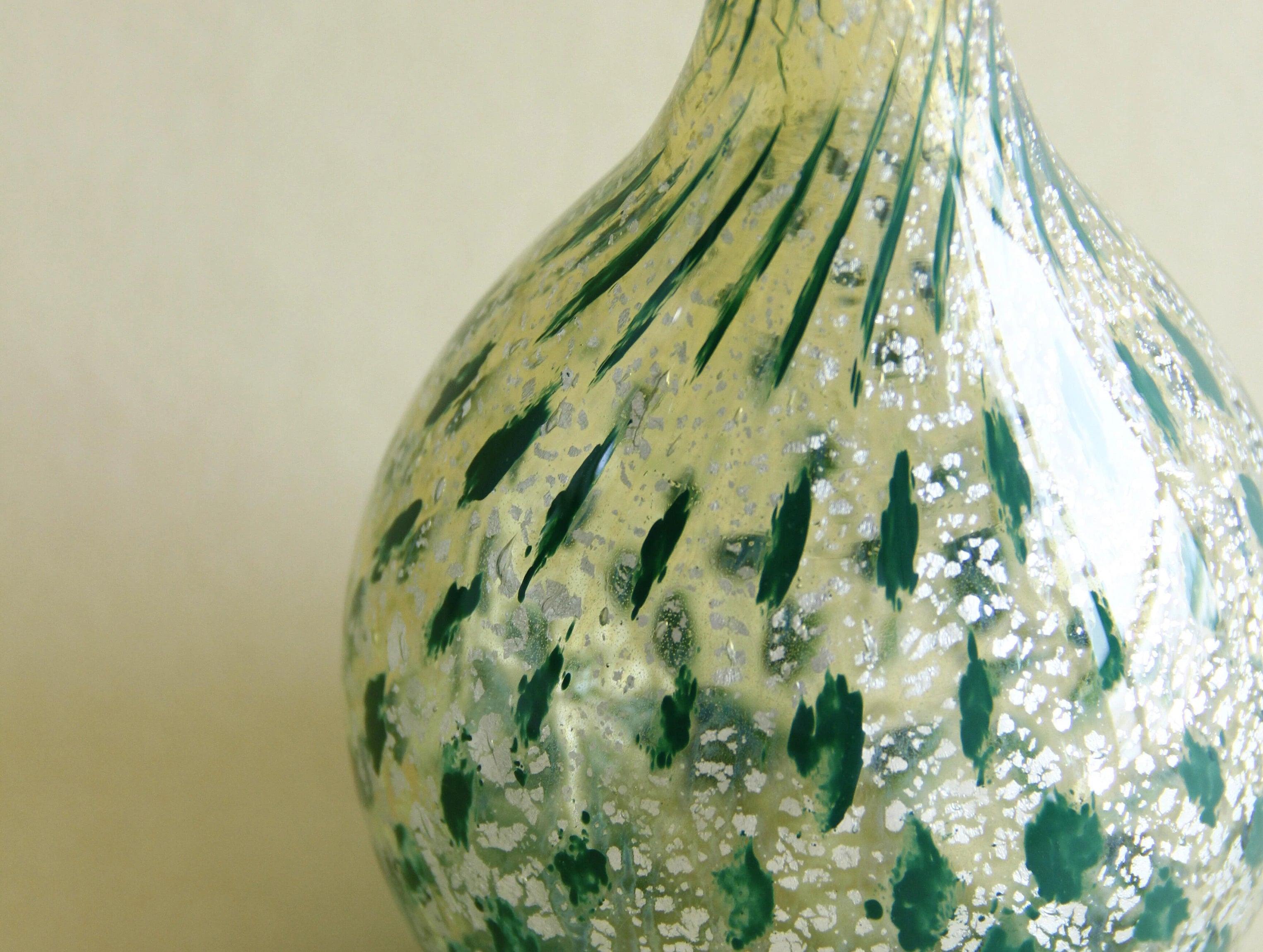 Silver-foil art glass vase, three-quarter view